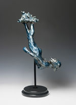"Taking the Plunge"female water diver sculpture by Gregory Reade